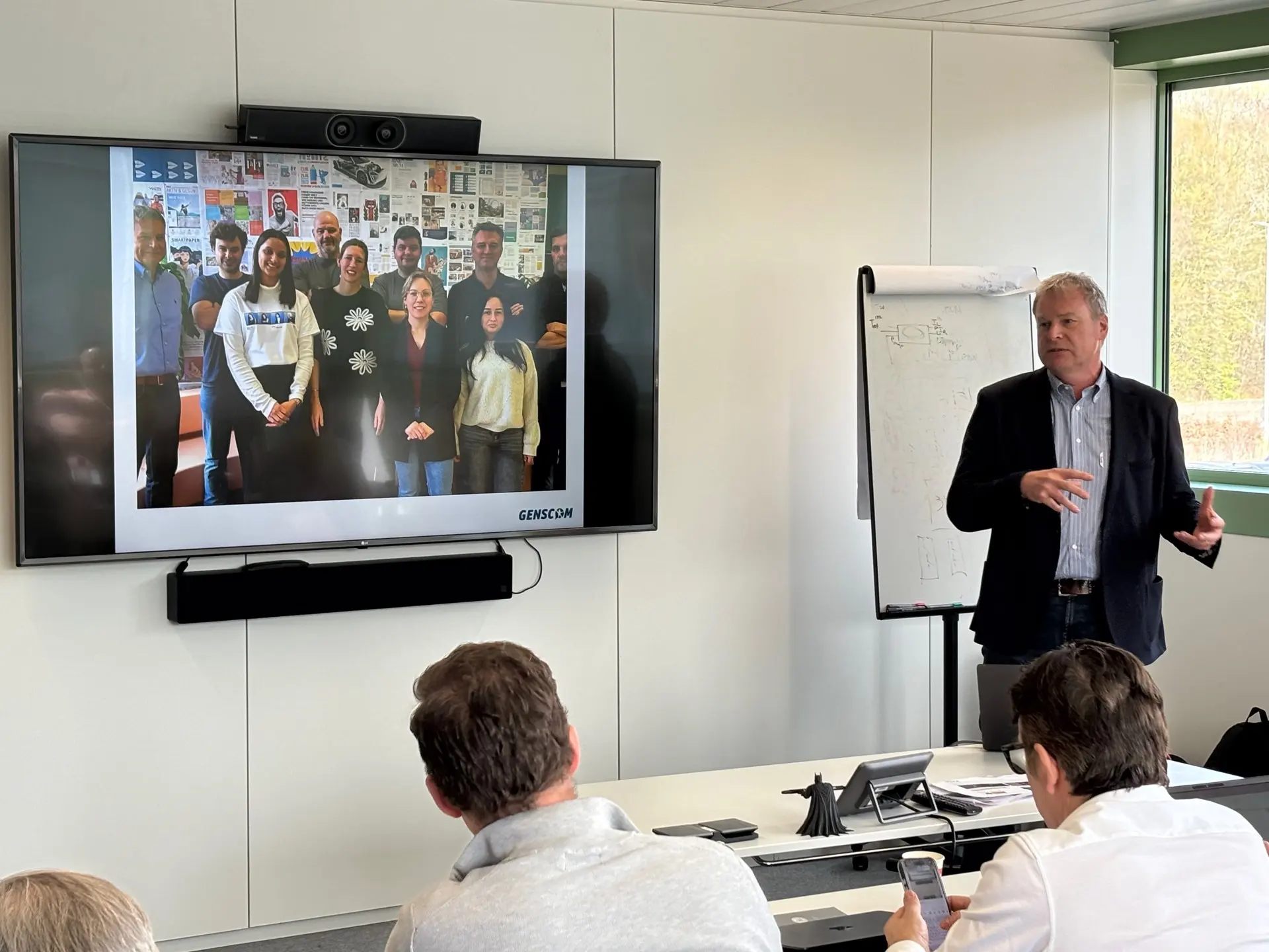A speaker explains the practical case from the printing industry