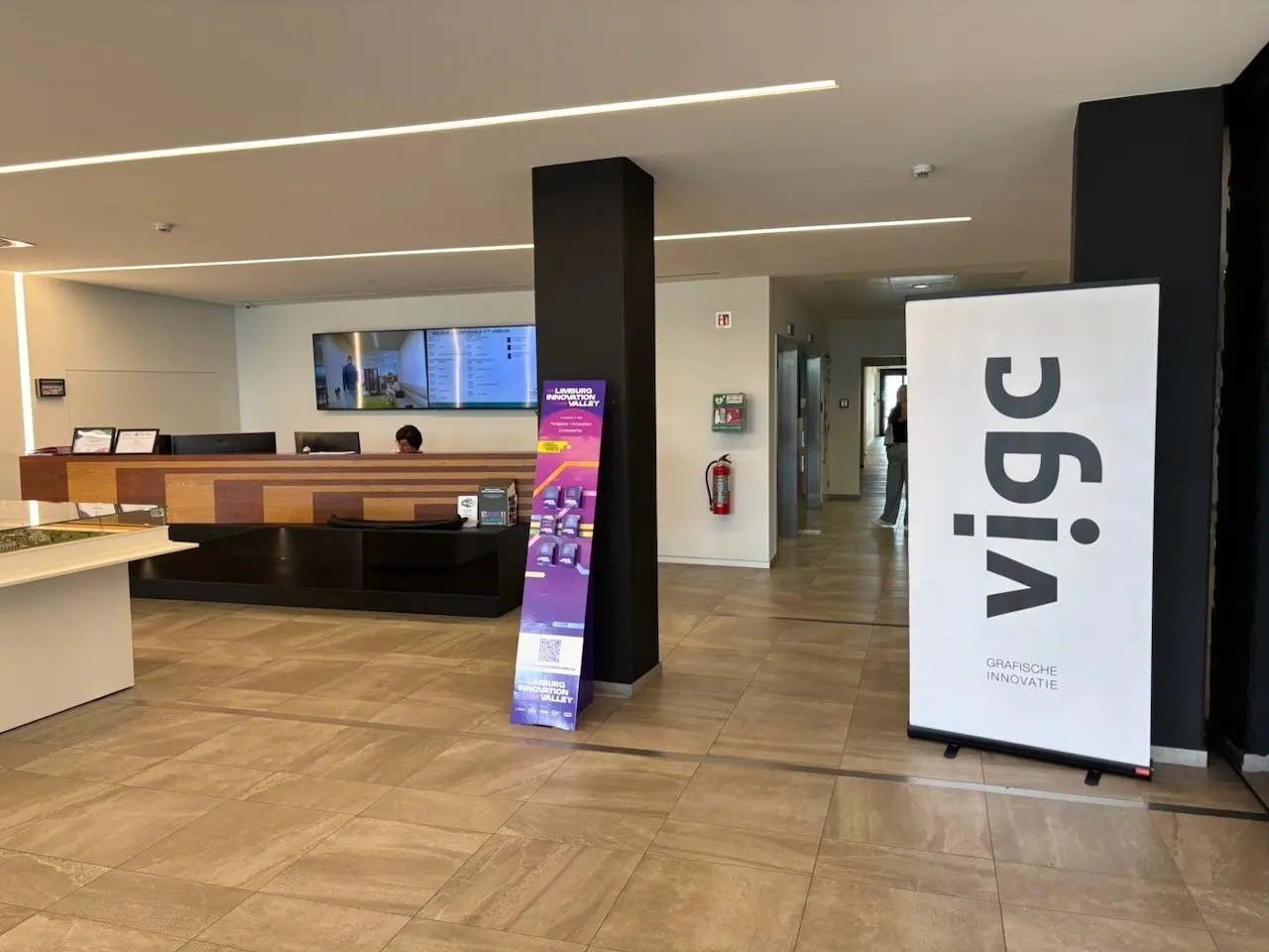 The reception desk with the VIGC banner at the steering group of 24 September 2026 in Hasselt